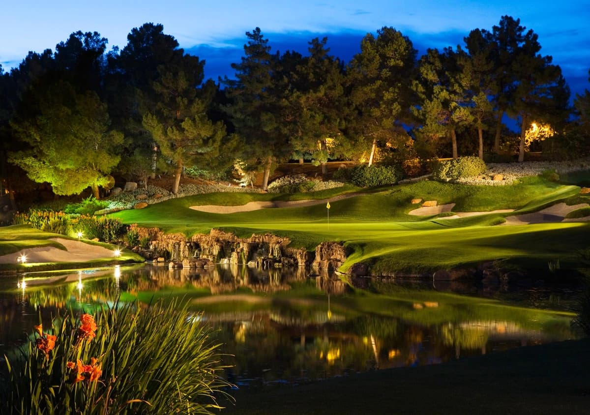 Golf course in the shadows, at twilight