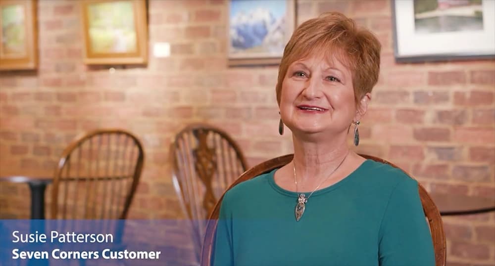 Woman being interviewed in a restaurant