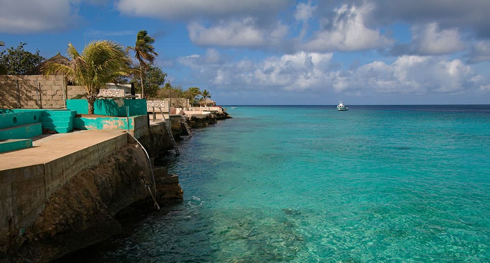 Tropical island with turquoise waters and blue skies